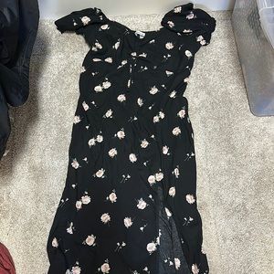 Women’s Hollister size M black maxi dress with slit.